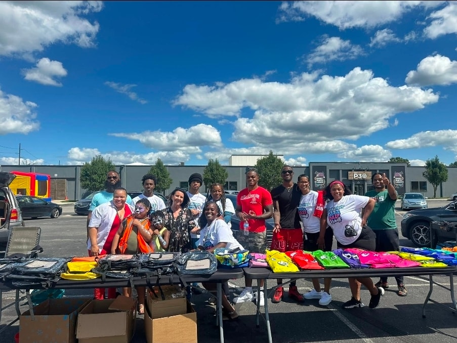 Community members at P.A.T.H. event table